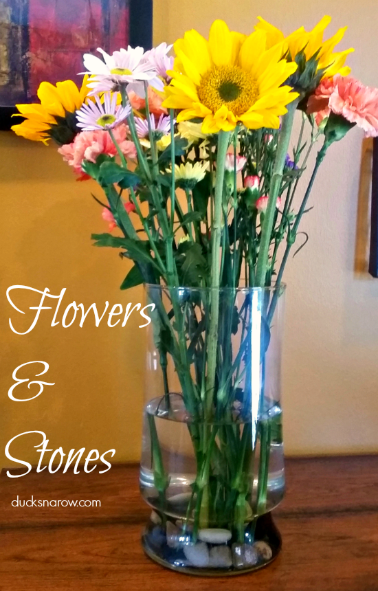 Make Your Flowers In a Clear Glass Vase Look Fabulous With Stones
